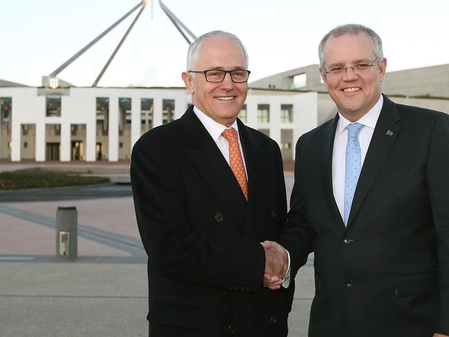 The Prime Minister Malcolm Turnbull with Treasurer Scott Morrison outside parliament House in Canberra to chat to TV networks about the Budget. Picture Kym Smith