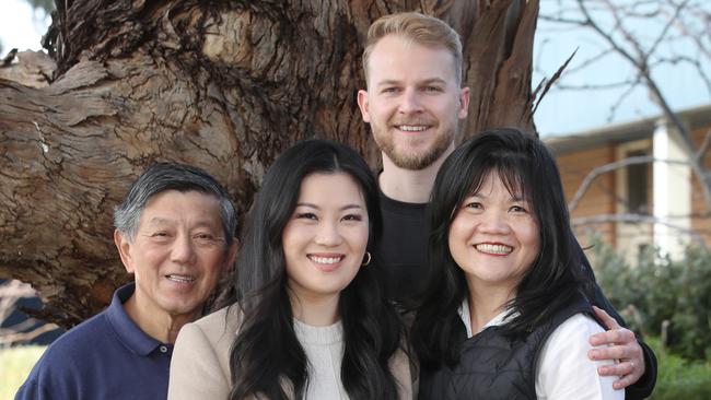 Nicole Werner, centre, with dad Peter, husband Fraser and mum Belinda. Picture: David Crosling