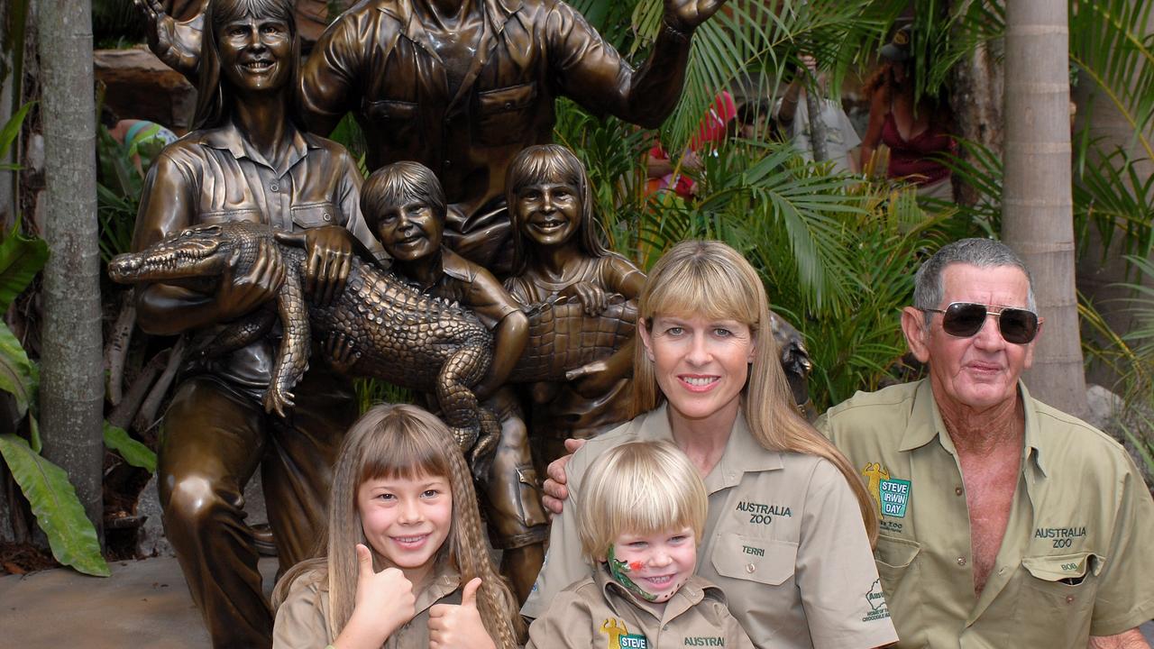 BRISBANE, AUSTRALIA - NOVEMBER 15: (L-R) Unveiling the memorial family statue Bindi Irwin, Robert Irwin, Terri Irwin and Steve's father Bob Irwin attend "Steve Irwin Memorial Day" at Australia Zoo on November 15, 2007 on the Sunshine Coast, Australia. Steve Irwin day is a celebration of the life of the late Steve Irwin, the enigmatic "Crocodile Hunter" who was killed by a stingray barb to his chest on September 4, 2006 whilst filming a documentary in Queensland. Australia Zoo is celebrating his life by inviting people from around the world to join in remembering what Steve was famous for: family, fun and wildlife. (Photo by Marc Grimwade/WireImage)