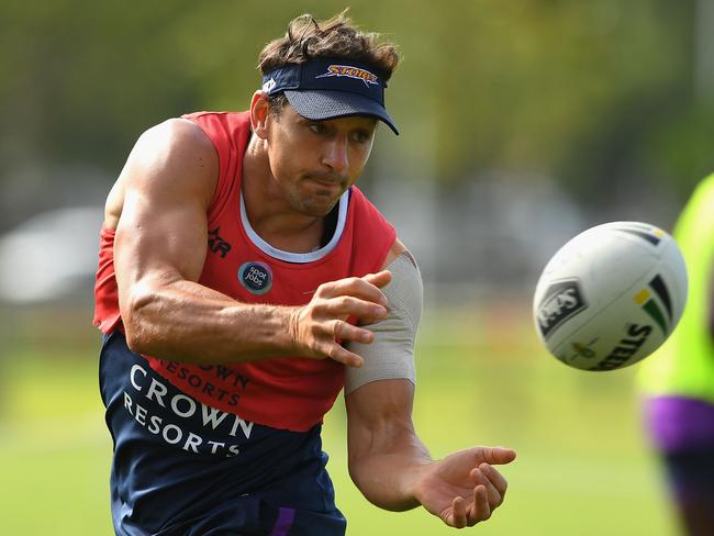 MELBOURNE, AUSTRALIA - DECEMBER 16: Billy Slater of the Storm passes the ball during a Melbourne Storm NRL training session at Gosch's Paddock on December 16, 2016 in Melbourne, Australia. (Photo by Quinn Rooney/Getty Images)