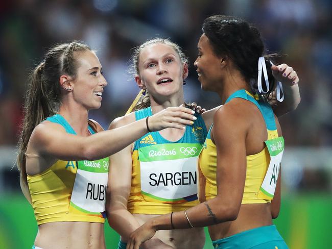 Annelise Rubie, Caitlin Sargent and Morgan Mitchell celebrates thier run in the Women's 4 x 400m Relay Round 1 during the Athletics on Day 14 of the Rio 2016 Olympic Games. Picture. Phil Hillyard