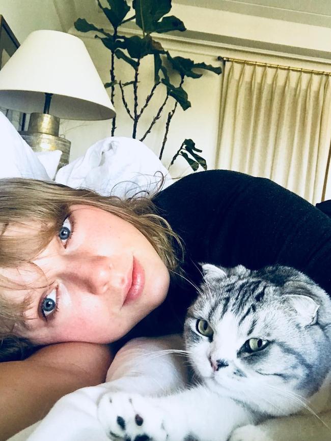 Taylor Swift with one of her cats.