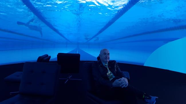 Chris Griffith enjoy a 360 degree view of the swimming at The Commonwealth Games at Southport transmitted from the venue using fibre and one 5G channel to Optus' 5G live dome at Broadbeach.