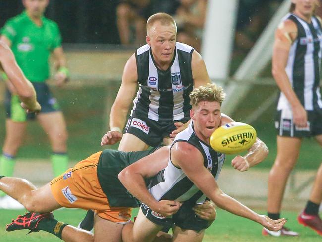 Baxter Mensch gets a handball free for Palmerston in the Round 8 match against St Mary’s which was later declared a forfeit. Picture: Glenn Campbell.