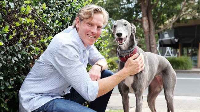 Dr Lewis Hunt and adopted greyhound Heidi ahead of Sunday’s National Adoption Day Picture: Tim Hunter.