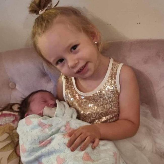 Faith Tischler, 2 with her new baby sister Freya Tischler.