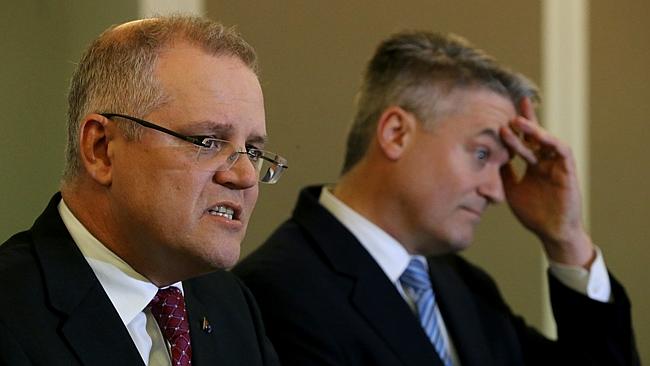 Treasurer Scott Morrison and Finance Minister Mathias Cormann explain some of the government's figures. Picture: Ray Strange