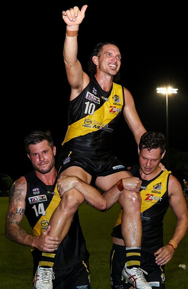 Cam Ilett is carried off after his last game for the Nightcliff Tigers at Nightcliff Oval in Round 18 of the 2024-25 NTFL season. Picture: Celina Whan / AFLNT Media