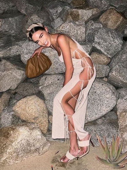 The Aya Muse dress left little to the imagination, exposing one side of the model’s body. Picture: Instagram/oliviaculpo