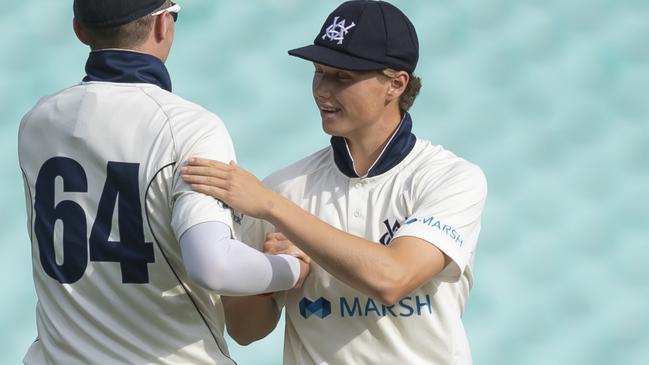 Wil Parker of Victoria (right) celebrates with Peter Siddle after taking the wicket of Kurtis Patterson of the Blues during day 2 of the Marsh Sheffield Shield match between the NSW Blues and Victoria at the SCG in Sydney, Saturday, February 15, 2020. (AAP Image/Craig Golding) NO ARCHIVING, EDITORIAL USE ONLY, IMAGES TO BE USED FOR NEWS REPORTING PURPOSES ONLY, NO COMMERCIAL USE WHATSOEVER, NO USE IN BOOKS WITHOUT PRIOR WRITTEN CONSENT FROM AAP