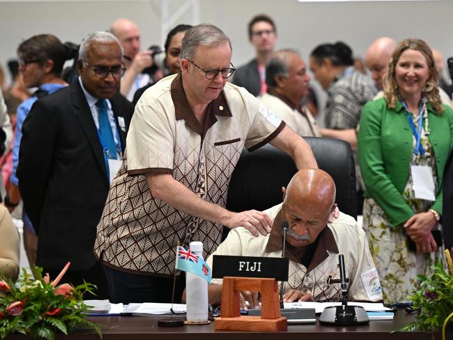 Australian Prime Minister Anthony Albanese greets the Prime Minister of Fiji Sitiveni Rabuka at the start of the plenary session at the 53rd Pacific Islands Forum Leaders Meeting in Nuku'alofa, Tonga, Wednesday, August 28, 2024. Leaders from Pacific Island nations are gathering in Tonga for the 53rd Pacific Islands Forum Leaders Meeting. (AAP Image/Lukas Coch) NO ARCHIVING