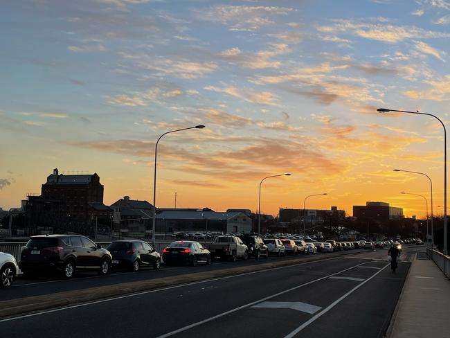 A long line of drivers queues up at the Covid testing site at Hart's Mill, Port Adelaide on Wednesday morning 21 July 2021. Picture: Dean Martin