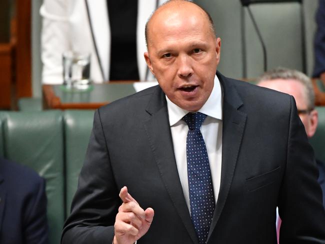 Minister for Home Affairs Peter Dutton during Question Time in the House of Representatives at Parliament House in Canberra, Wednesday, February 13, 2019. (AAP Image/Mick Tsikas) NO ARCHIVING