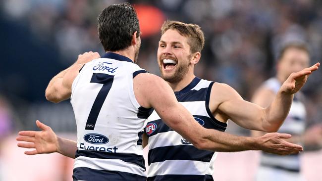 Tom Atkins (right) is hoping to become the next Cat to win the AFLPA’s most courageous player award. Picture: Getty Images