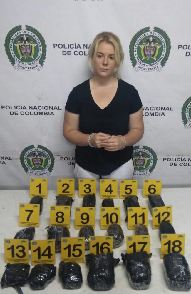 Australian Cassandra Sainsbury in handcuffs after she was arrested at the international airport in Bogota, Colombia. Picture: Colombia's National Police via AP