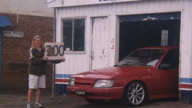 Rachelle Childs with a Holden VK Commodore. Picture: Supplied