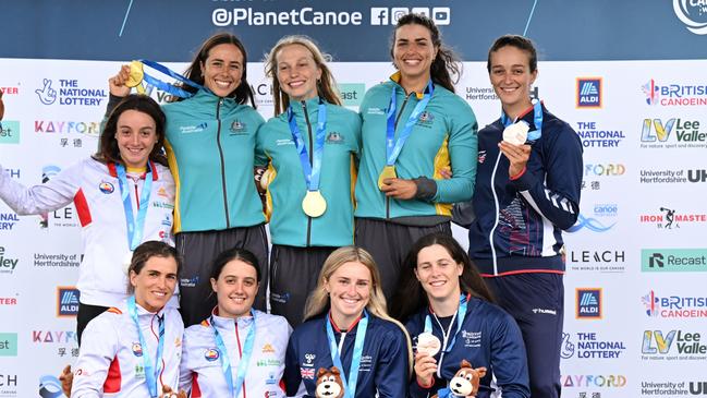 Jessica Fox, Noemie Fox and Kate Eckhardt of Australia, silver medallists Maialen Chourraut, Laia Sorribes and Oloatz Arregue of Spain and bronze medallists Mallory Franklin, Kimberley Woods and Phoebe Spicer of Great Britain pose after the Kayak Teams final.