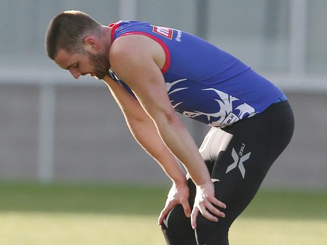 Western Bulldogs training. Matthew Suckling with Physio during a test on his injured achilles at the end of todays session . Pic: Michael Klein