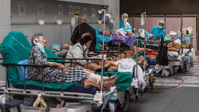 Patients in a holding area next to the Princess Margaret hospital in Hong Kong. Picture: Dale de la Rey/AFP