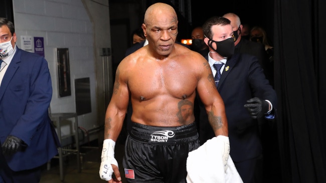 LOS ANGELES, CALIFORNIA - NOVEMBER 28: Mike Tyson exits the ring after receiving a split draw against Roy Jones Jr. during Mike Tyson vs Roy Jones Jr. presented by Triller at Staples Center on November 28, 2020 in Los Angeles, California. (Photo by Joe Scarnici/Getty Images for Triller)