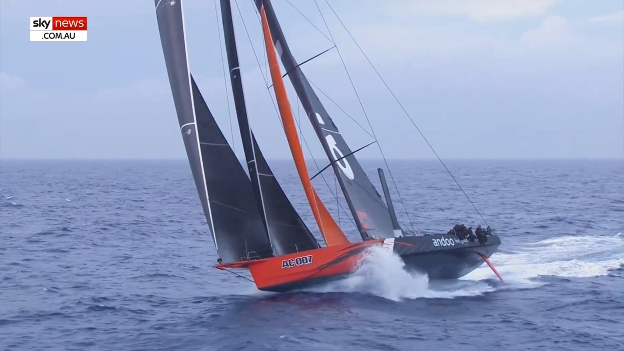 Wild weather as two super maxis battle for Sydney to Hobart line honours