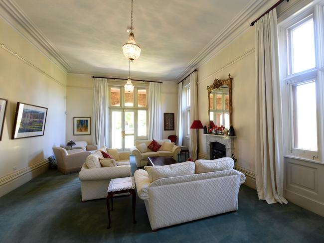 Archbishop Geoffrey Smith at Bishop's Court North Adelaide which is being put up for sale by the church. The drawing room or lounge room. Picture: Tricia Watkinson