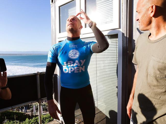 Mick Fanning reacting after being attacked by a shark last year. Picture: EPA/Kelly Cestari