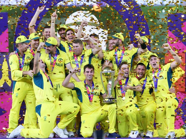 AHMEDABAD, INDIA - NOVEMBER 19: Pat Cummins of Australia lifts the ICC Men's Cricket World Cup Trophy following the ICC Men's Cricket World Cup India 2023 Final between India and Australia at Narendra Modi Stadium on November 19, 2023 in Ahmedabad, India. (Photo by Robert Cianflone/Getty Images)