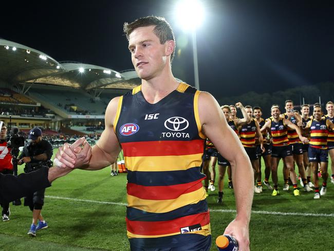 AFL - Adelaide Crows v St Kilda at Adelaide Oval. JOnathon Beech gets to lead the team off after his first AFL game. Picture Sarah Reed