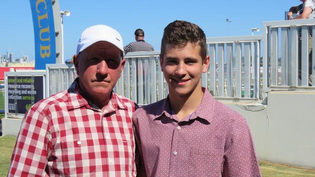 The Gold Coast is proving a happy hunting ground for Toowoomba trainer Lindsay Hatch (left), pictured here with his son Thomas at the Aquis Park track. Photo: supplied