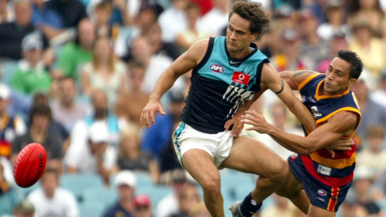  Gavin Wanganeen of Port Adelaide and Andrew McLeod of the Crows go head to head in 2005.