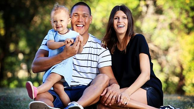 Huegill with his wife Sara and daughter Mila. 