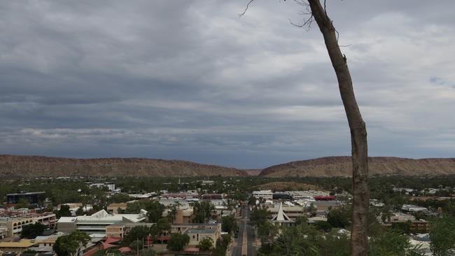 Clouds gather above Alice Springs, where heavy rain is expected from Tuesday. Photo: Laura Hooper.