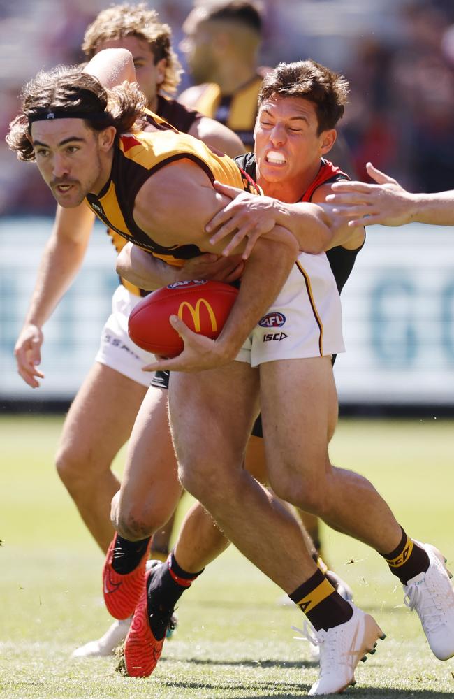 Jye Caldwell tackles Hawk Jai Newcombe. Picture: Michael Klein