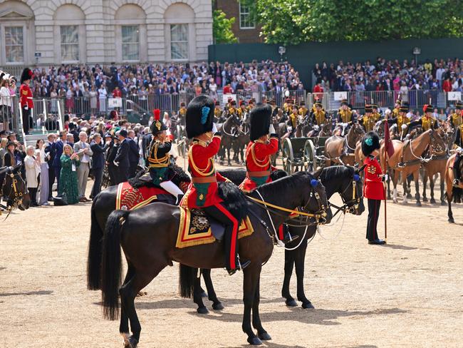 Princess Anne, Prince Charles, and Prince William salute. Picture: Getty Images