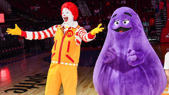 Ronald McDonald and Grimace in Houston, Texas. Picture: Marcus Ingram/Getty Images