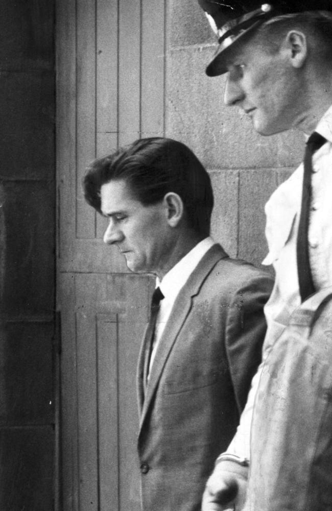 Prisoner Ronald Ryan (left) is taken from the cells to court in February 1966. Pic: Supplied