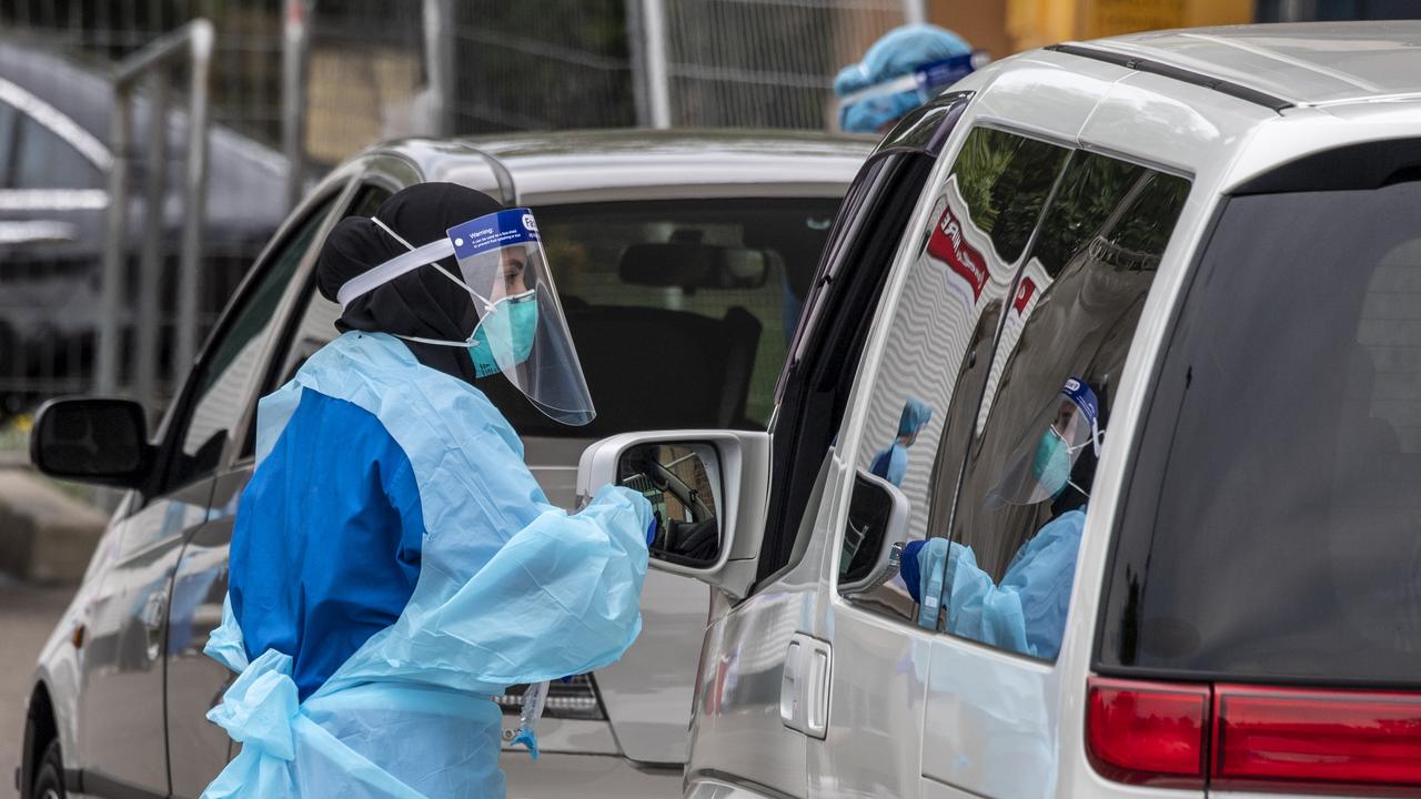 COVID-19 testing at Auburn Community Health Care Centre Drive-through Clinic following the outbreak of the Berala cluster. Picture: Monique Harmer