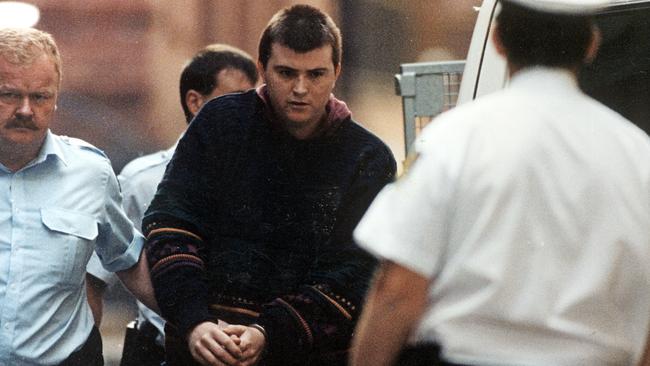 Frankston serial killer Paul Denyer being taken away by police.