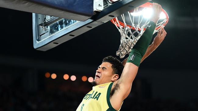 Josh Green as it rained dunks. Photo by Morgan Hancock/Getty Images