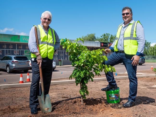 Darwin Lord Mayor Kon Vatskalis and Richardson Ward alderman George Lambrinidis begin landscaping works at Wagaman shops, one of eight across Darwin municipality. Picture: Che Chorley