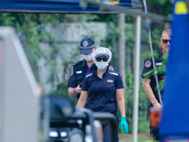 NT police investigate as a males body was found in a driveway in Driver on Saturday morning.Picture: Glenn Campbell