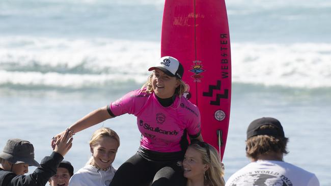 WINNER: Local surfer Nyxie Ryan being chaired up the beach after winning the 16 Girls at the Skullcandy Oz Grom Open at Lennox Head in 2019.