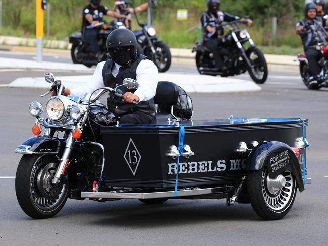 This unique black coffin for Rebels bikie Darren Wallace has Rebels MC Australia printed on it. Picture: Adam Taylor