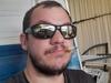 Man glassed, beer can hurled in roommate clash