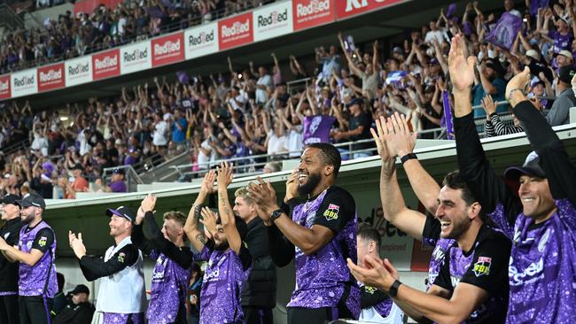 HOBART, AUSTRALIA - JANUARY 27: Hurricanes players celebrate Mitch Owen of the Hurricanes scoring a century during the BBL The Final match between Hobart Hurricanes and Sydney Thunder at Ninja Stadium on January 27, 2025 in Hobart, Australia. (Photo by Steve Bell/Getty Images)