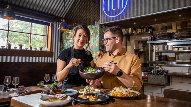 The Little Rickshaw owners Trinh and Michael Richards with food from the restaurant. Picture: Tom Huntley