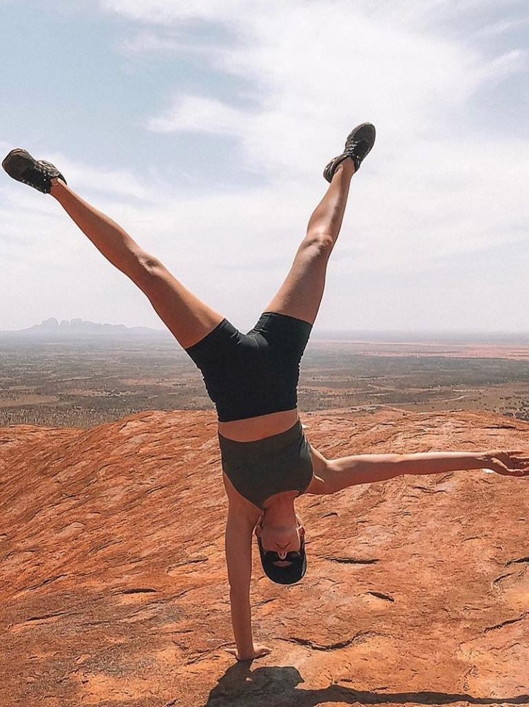 Tegan on top of Uluru before it closed to climbers this week.