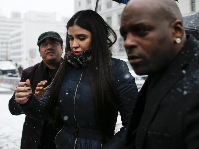 The 61-year-old’s wife Emma Coronel Aispuro, 29, said ‘he’s not dead’ and flashed her husband a thumbs up as she left the court. Picture: Kena Betancur / AFP 