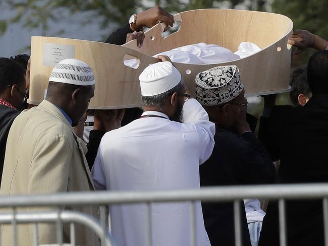 Mourners carry the casket of the youngest victim, three-year-old Mucaad Ibrahim at the Memorial Park Cemetery in Christchurch, New Zealand. Picture: AP